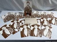 Spread of 24 sepia postcards showing front portrait, one on stand