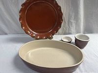 Group shot of pie plate, oval casserole, two ramekins