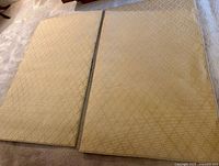 Both rugs side by side showing color, binding, and diamond pattern