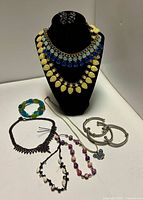 Group shot showing all seven jewelry pieces