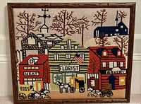 Front view of entire framed needlepoint artwork