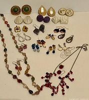Entire lot overview showing necklaces and multiple earring pairs