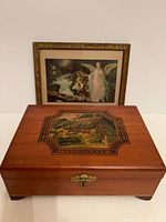 Framed print and wooden box front view