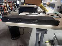 Front view of the Carver C-9 unit showing power LED and logo