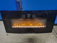 Front view showing flame effect and crystal bed