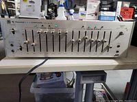 Front view showing sliders, switches, indicators and JVC branding