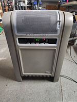 Front view of Lasko ceramic space heater showing grille, control panel and case