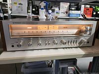 Full front view of Pioneer SX-650 receiver showing overall condition and controls