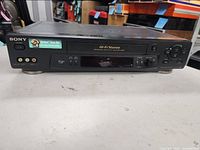 Front view showing brand, Hi-Fi Stereo marking, controls and front A/V inputs