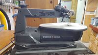 Full view of Porter Cable scroll saw on stand