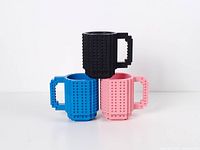 Three mugs stacked showing colors and stud pattern