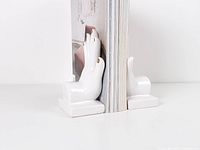 Bookends supporting books from side view