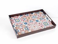 Full view of rectangular metal tray with colourful tile base