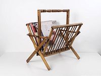 Rack partially loaded with magazines, showing overall form and slatted design.