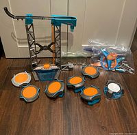 Complete BoomTrix set components laid out on floor