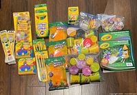 All art supplies laid out on floor showing quantity and packaging