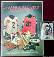 Front cover of Esso NHL All-Star Collection album alongside Johnny Bower sticker in protective sleeve