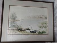 Full view of framed watercolor landscape