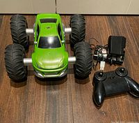 Top angle of truck, remote, battery and charger