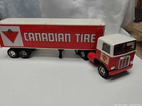 Full view of cab attached to Canadian Tire trailer