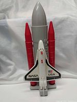 Full frontal view of assembled shuttle with boosters, tank and stand