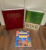 Front covers of all three wine books