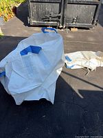 Two white and blue miniBulk bags | Maxsold