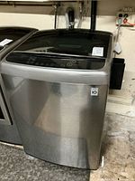 Full view of LG WT5680HVA washer front and side