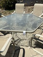 Overall view of glass-top patio table