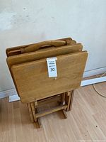 Front view of folded trays in stand