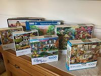 Front view of all seven boxed puzzles