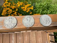 Front view of all three half dollars