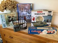 Front view of all five boxed items displayed together