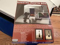 Front of product information sheet for digital photo box