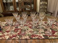 All 12 Italian crystal martini glasses on table