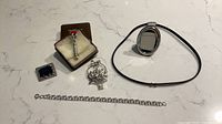 all six sterling jewelry items laid out
