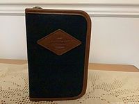 Closed kit showing exterior canvas case with logo patch