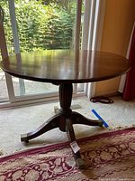 Full view of round pedestal dining table