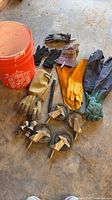 Overview showing bucket, gloves, casters, hitches, stake