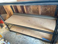 Front view of shelving unit showing all three shelves