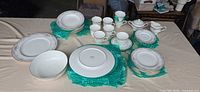 All pieces of Mikasa Queen's Rose dinnerware laid out