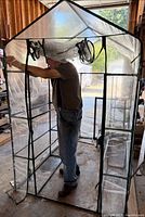 Assembled greenhouse demonstrating size and cover details