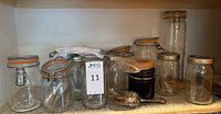 Group of Ball and Arc glass jars, produce bags, scoops, spare gaskets