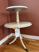 Full view of cream painted two-tier table