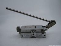 Left side view showing full tool, lever, knob