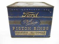 Front of blue Ford Steel Section piston rings tin showing branding and part number