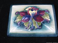 Lid top showing floral design