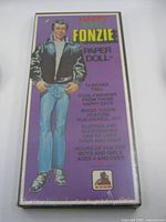Front of sealed Happy Days Fonzie paper doll box