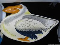 Full view of pelican tray front, showing shape and paint