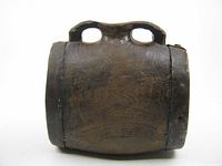front view of wooden barrel canteen showing handle openings and wear